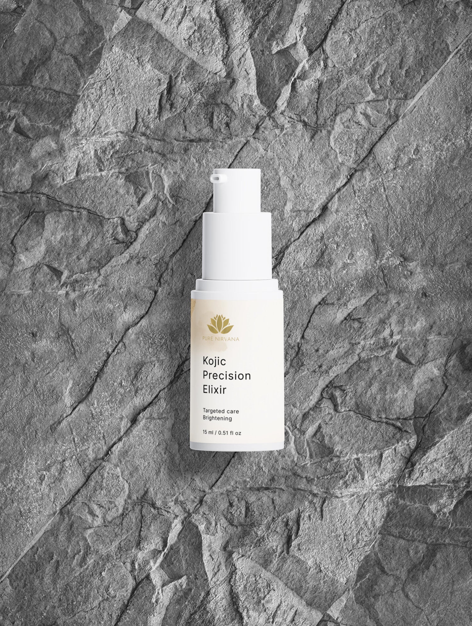 A white pump bottle of Kojic Precision Elixir targeted care brightening serum, set against a textured gray stone background.