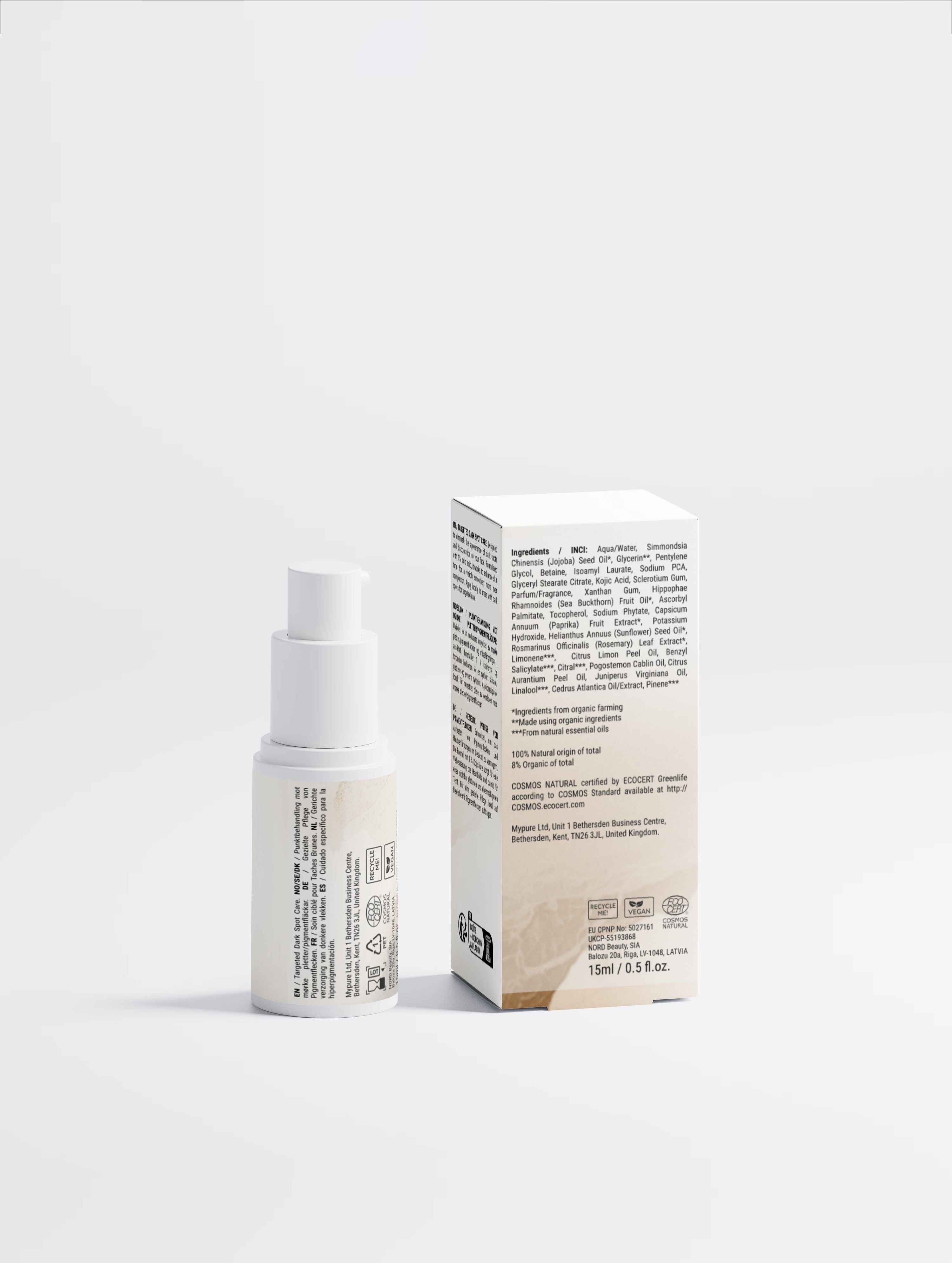 A white cosmetic pump bottle with a matching white cap stands next to its product box on a clean, light gray studio background. The packaging features black text and a small beige graphic at the bottom.