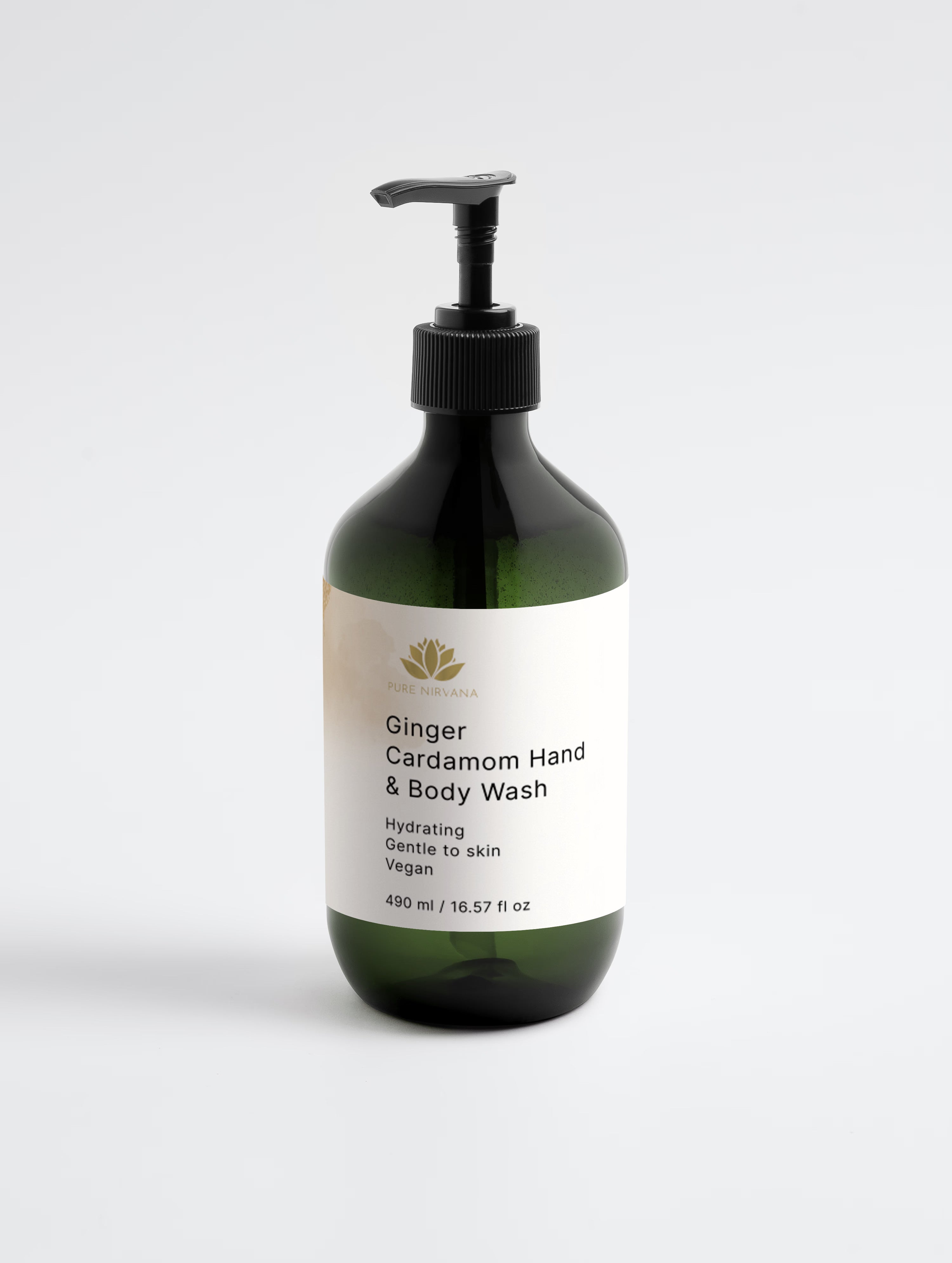 A dark green glass pump bottle of Peppermint Cedar Hand & Body Wash by The Body Shop, set against a clean light gray background.